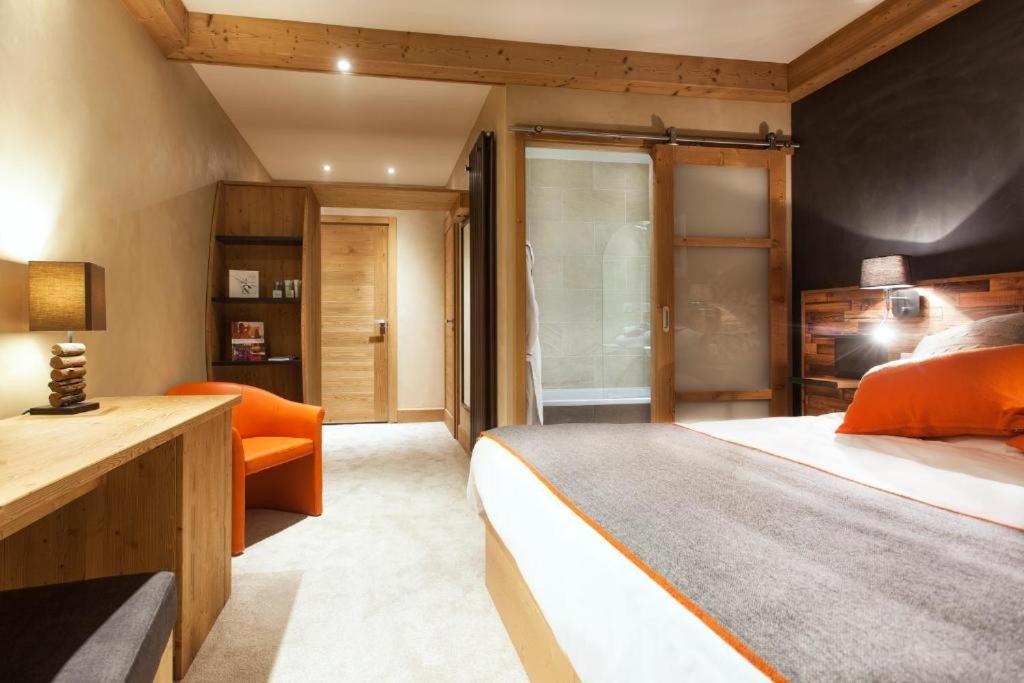 Un ou plusieurs lits dans un hébergement de l'établissement Hôtel Saint Charles Val Cenis