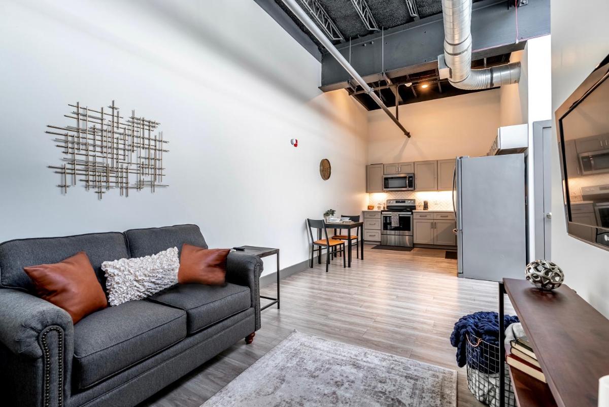 Lofted Living - Beautiful Luxury Loft - King Bed, Work Desk and Off-Street Parking Near Park Ave - Housity