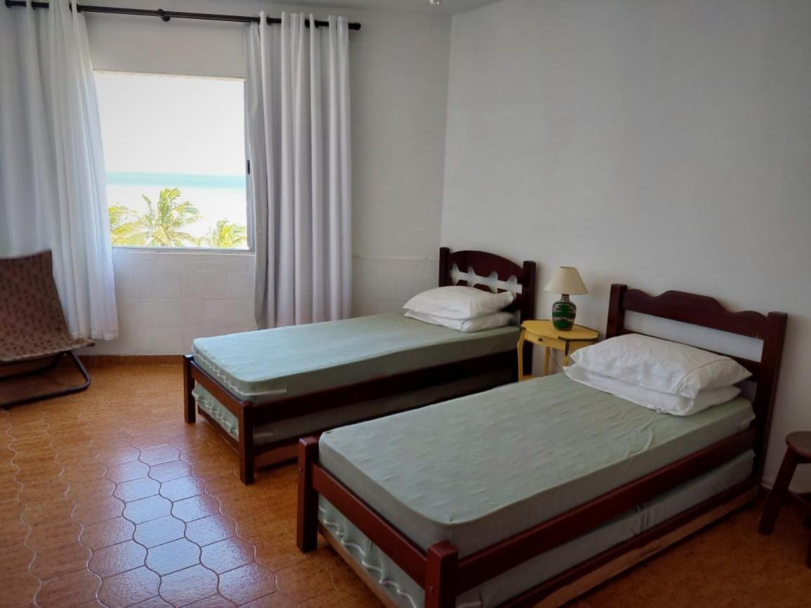Apto pé na areia com vista para o mar e Wifi - Housity
