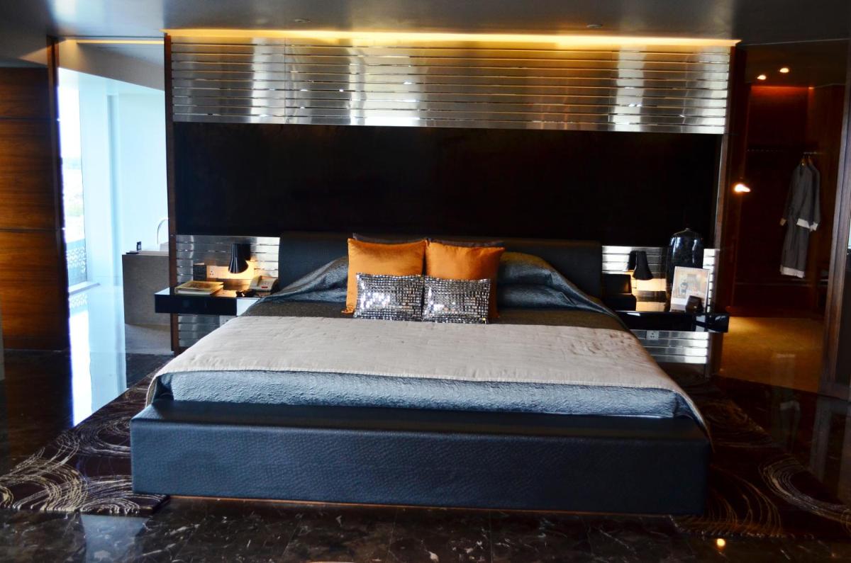 a bedroom with a large bed with a black headboard at The Park Hyderabad, Banjara Hills near Hussain Sagar Lake in Hyderabad a bedroom with a large bed with a black headboard at The Park Hyderabad, Banjara Hills near Hussain Sagar Lake in Hyderabad