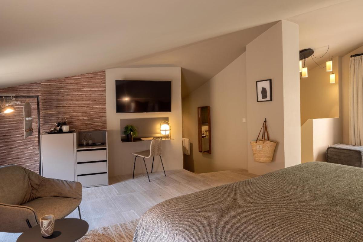 Cama o camas de una habitación en Can Aulí Luxury Retreat - Adults Only