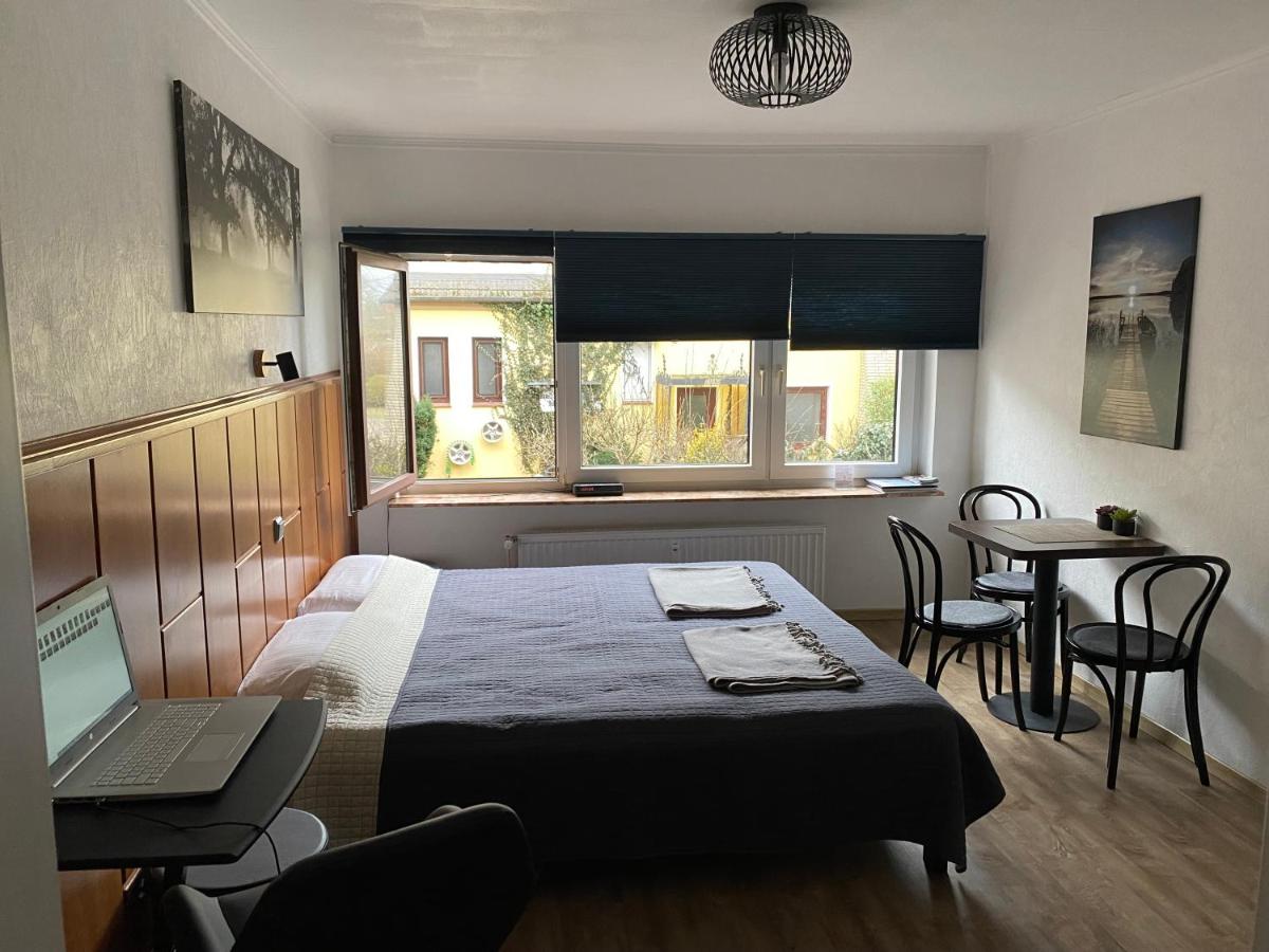 Plöni 12 Top FeWo mit eigenem Bootssteg am Plöner See - Housity