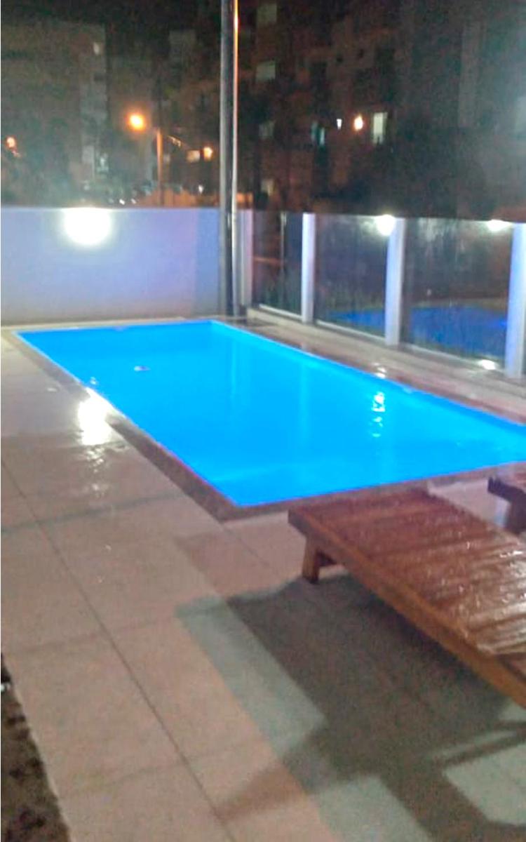 Suitetrails - Apto na praia de Palmas, climatizado, com piscina, próximo ao mar e com jardim privativo