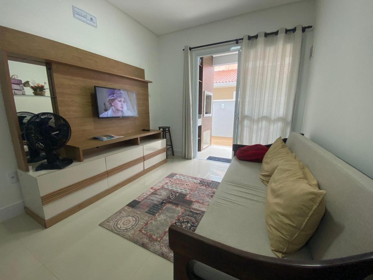 Suitetrails - Apto na praia de Palmas, climatizado, com piscina, próximo ao mar e com jardim privativo