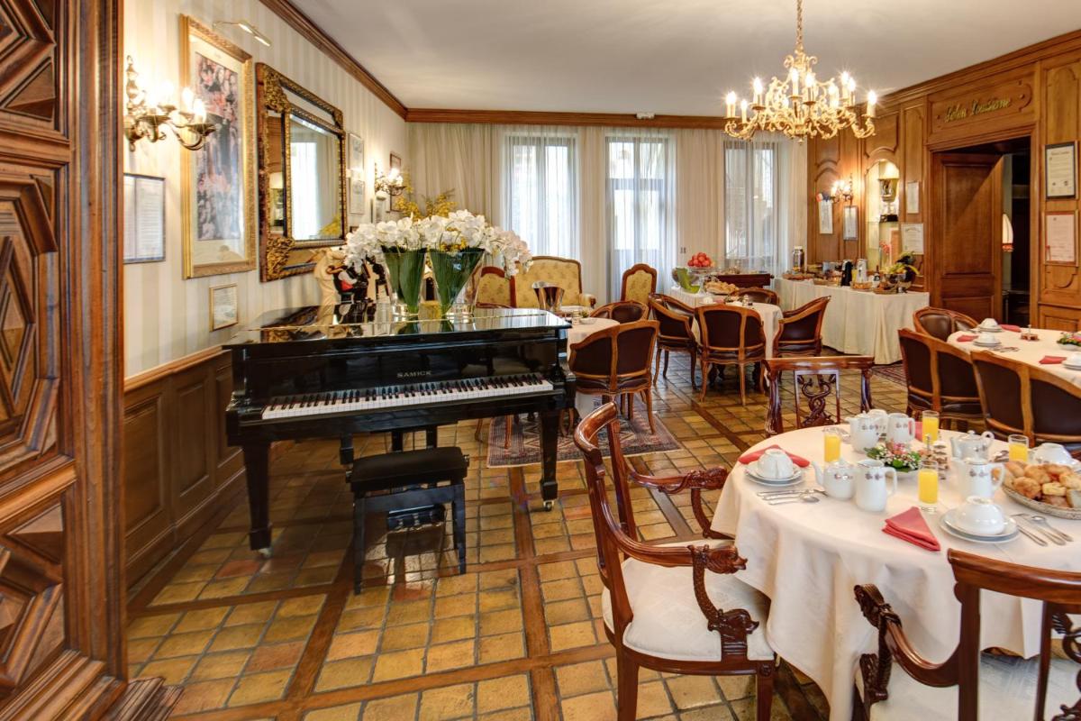 Restaurant ou autre lieu de restauration dans l'établissement Hôtel Le Cep & Spa