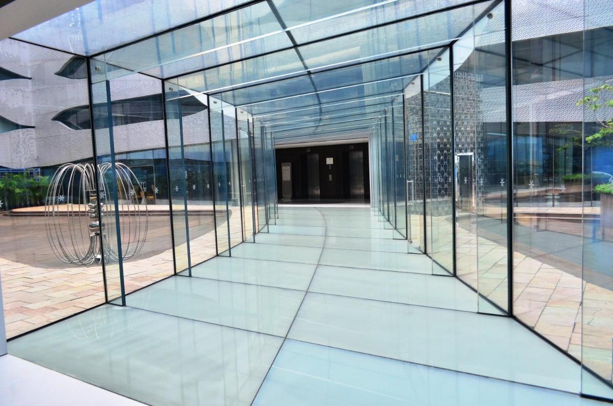 an external view of a glass facade of a building at The Park Hyderabad, Banjara Hills near Hussain Sagar Lake in Hyderabad an external view of a glass facade of a building at The Park Hyderabad, Banjara Hills near Hussain Sagar Lake in Hyderabad