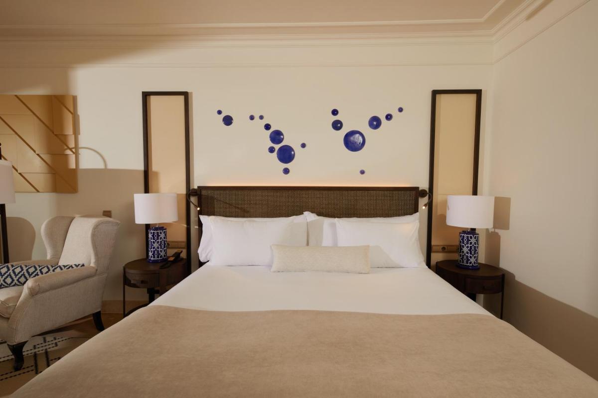 Cama o camas de una habitación en Secrets Bahía Real Resort & Spa Adults only