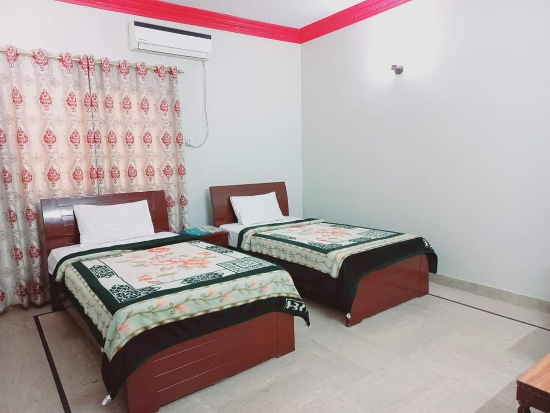 Cosy Inn Guest House Karachi - Housity