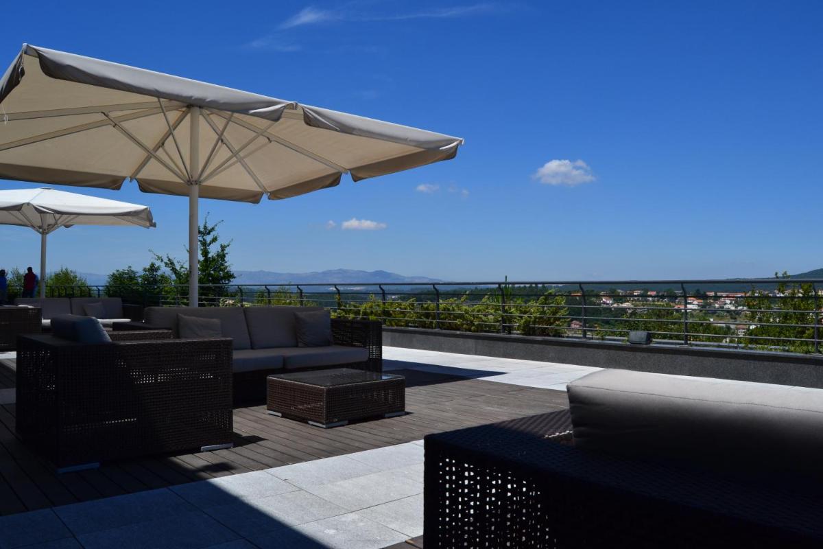 Uma varanda ou terraço em Montebelo Viseu Congress Hotel & Spa