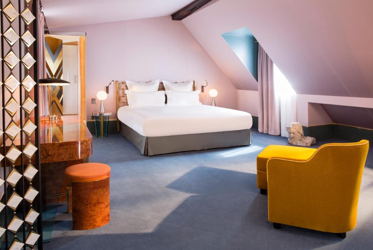 Un ou plusieurs lits dans un hébergement de l'établissement Hôtel Saint-Marc