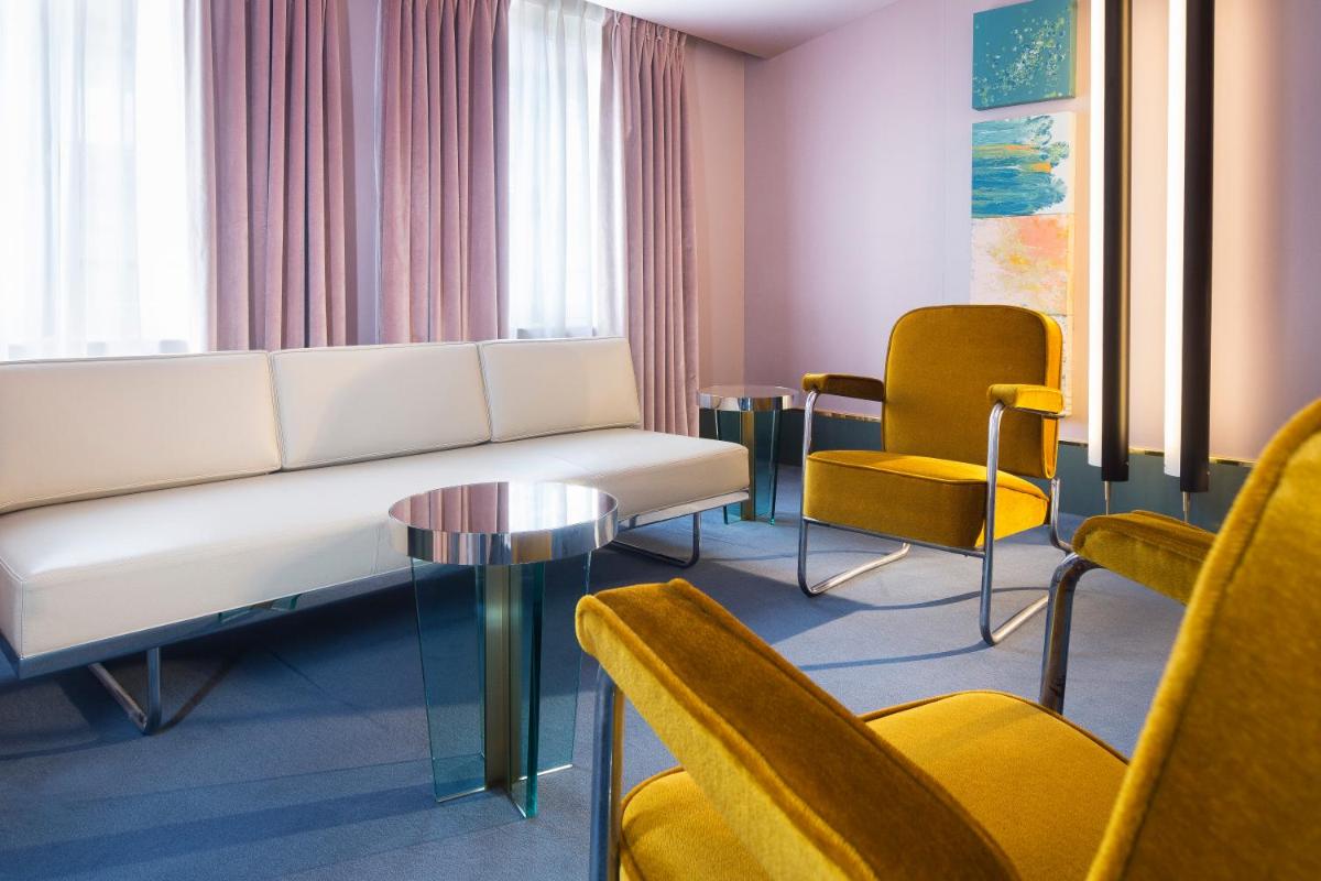 Coin salon dans l'établissement Hôtel Saint-Marc