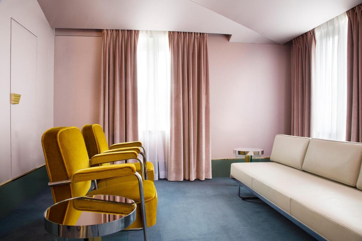 Coin salon dans l'établissement Hôtel Saint-Marc