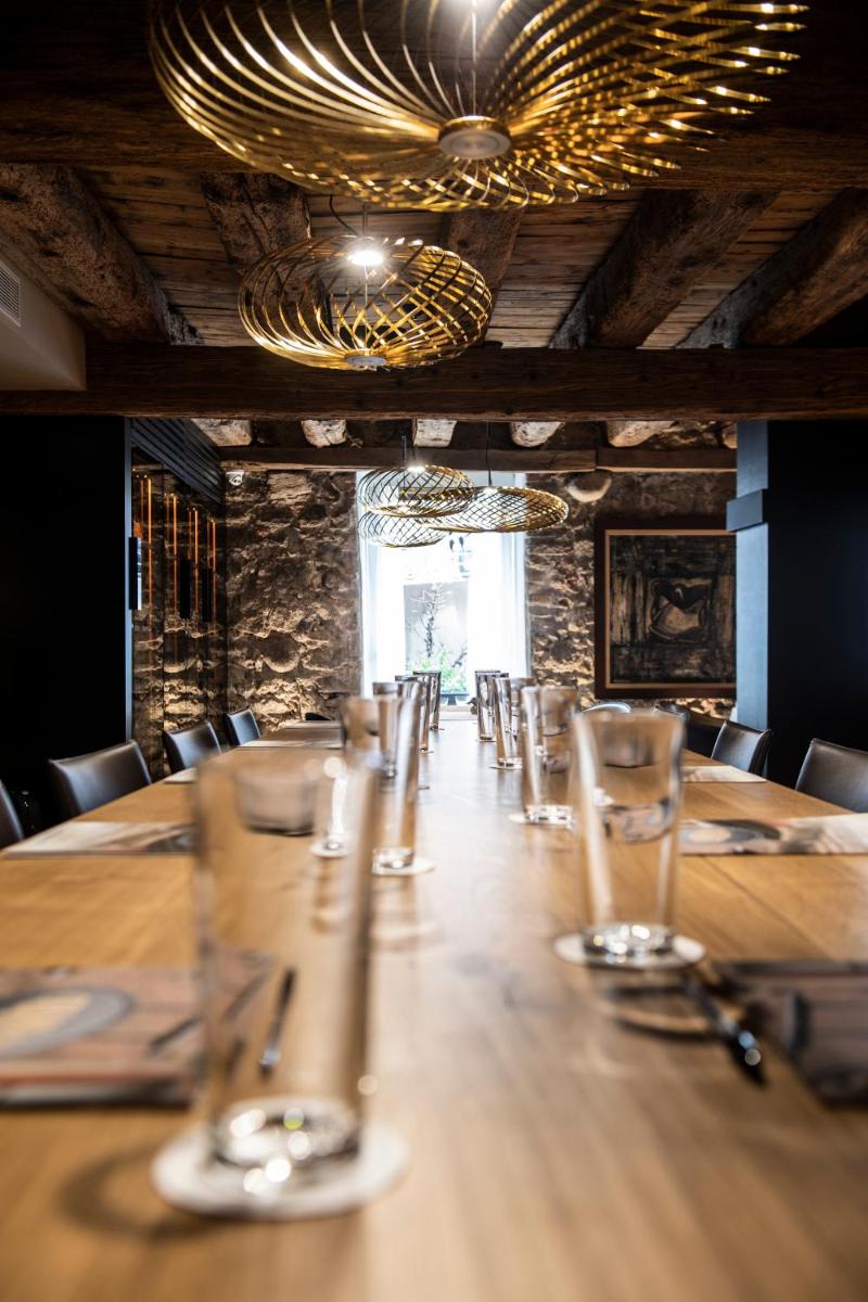Restaurant ou autre lieu de restauration dans l'établissement Relais et Châteaux Le Chambard