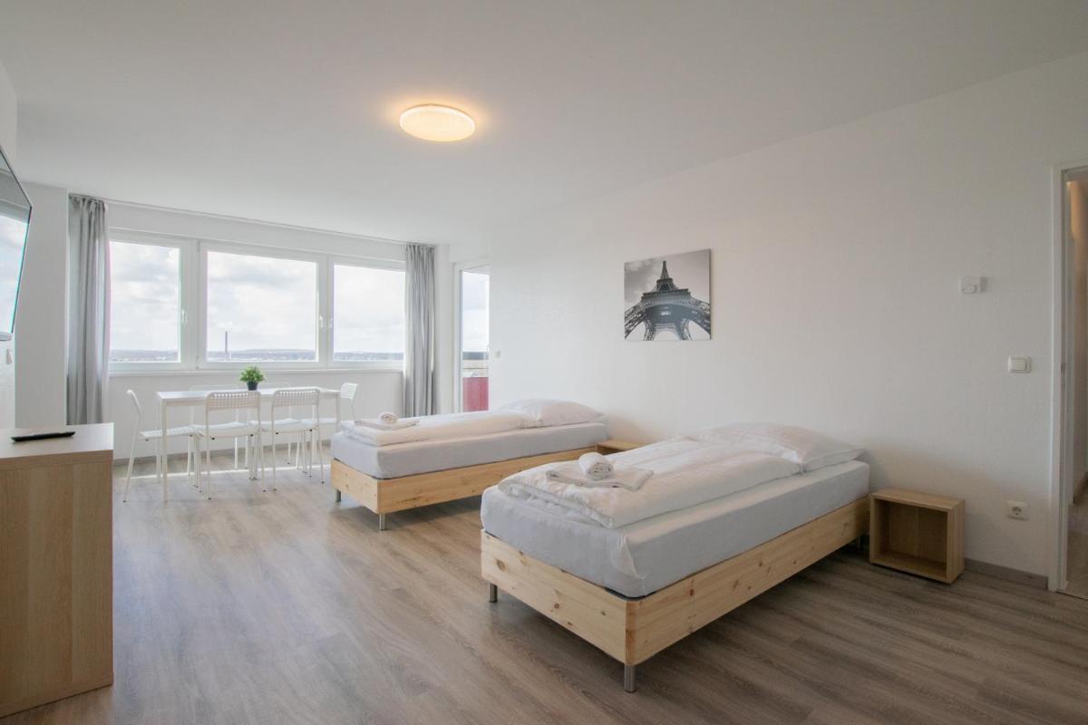 T&K Apartments Comfortable 3 Room Apartments with Balcony - Housity