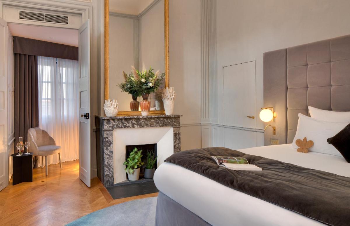 Un ou plusieurs lits dans un hébergement de l'établissement Hôtel Richer De Belleval - Relais & Châteaux