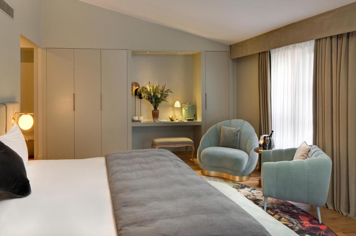 Un ou plusieurs lits dans un hébergement de l'établissement Hôtel Richer De Belleval - Relais & Châteaux