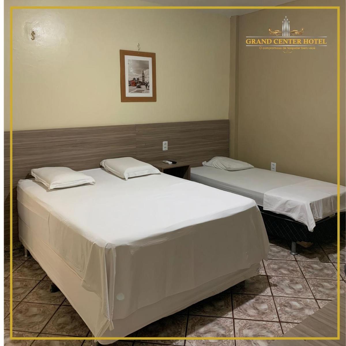 Grand Center Hotel - Housity