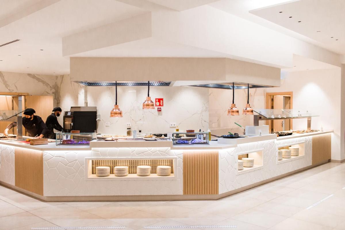 Una cocina o zona de cocina en Gran Sagitario