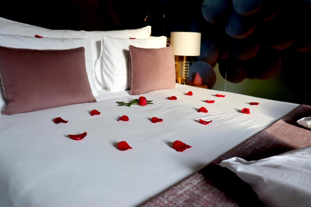 Uma cama ou camas num quarto em Douro Castelo Signature Hotel & Spa