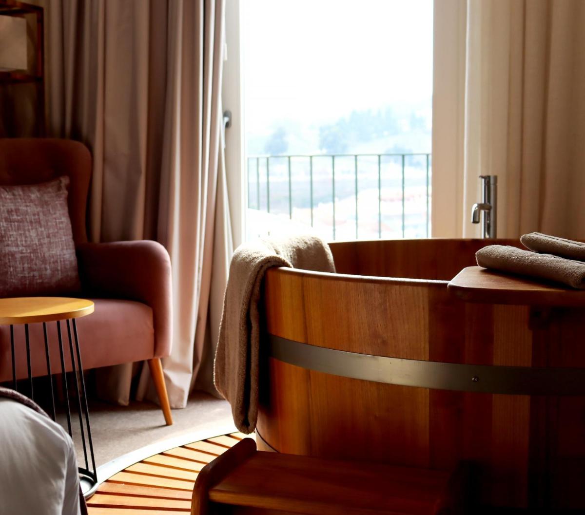 Uma área de estar em Douro Castelo Signature Hotel & Spa