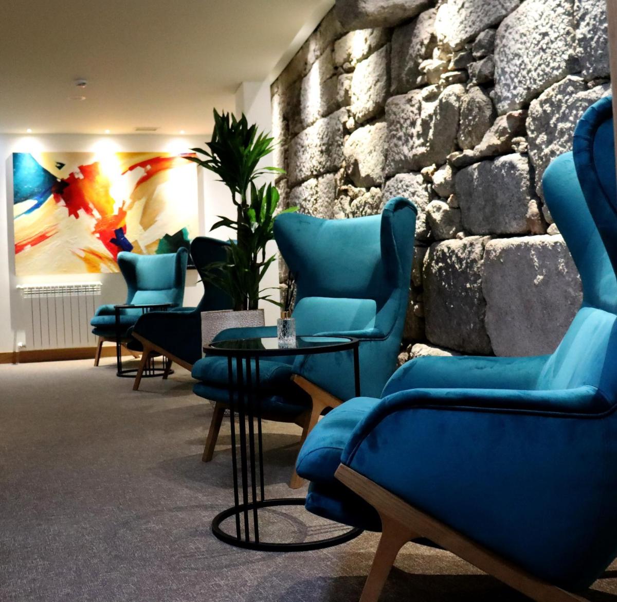 Uma área de estar em Douro Castelo Signature Hotel & Spa