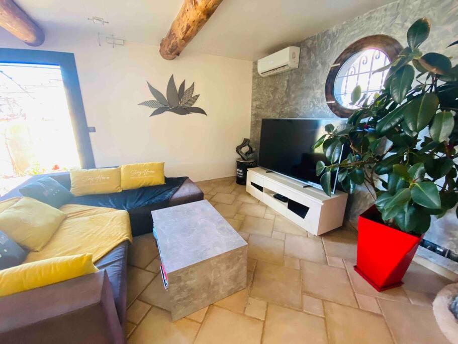 Agréable maison cœur de village climatisée - wifi - Housity
