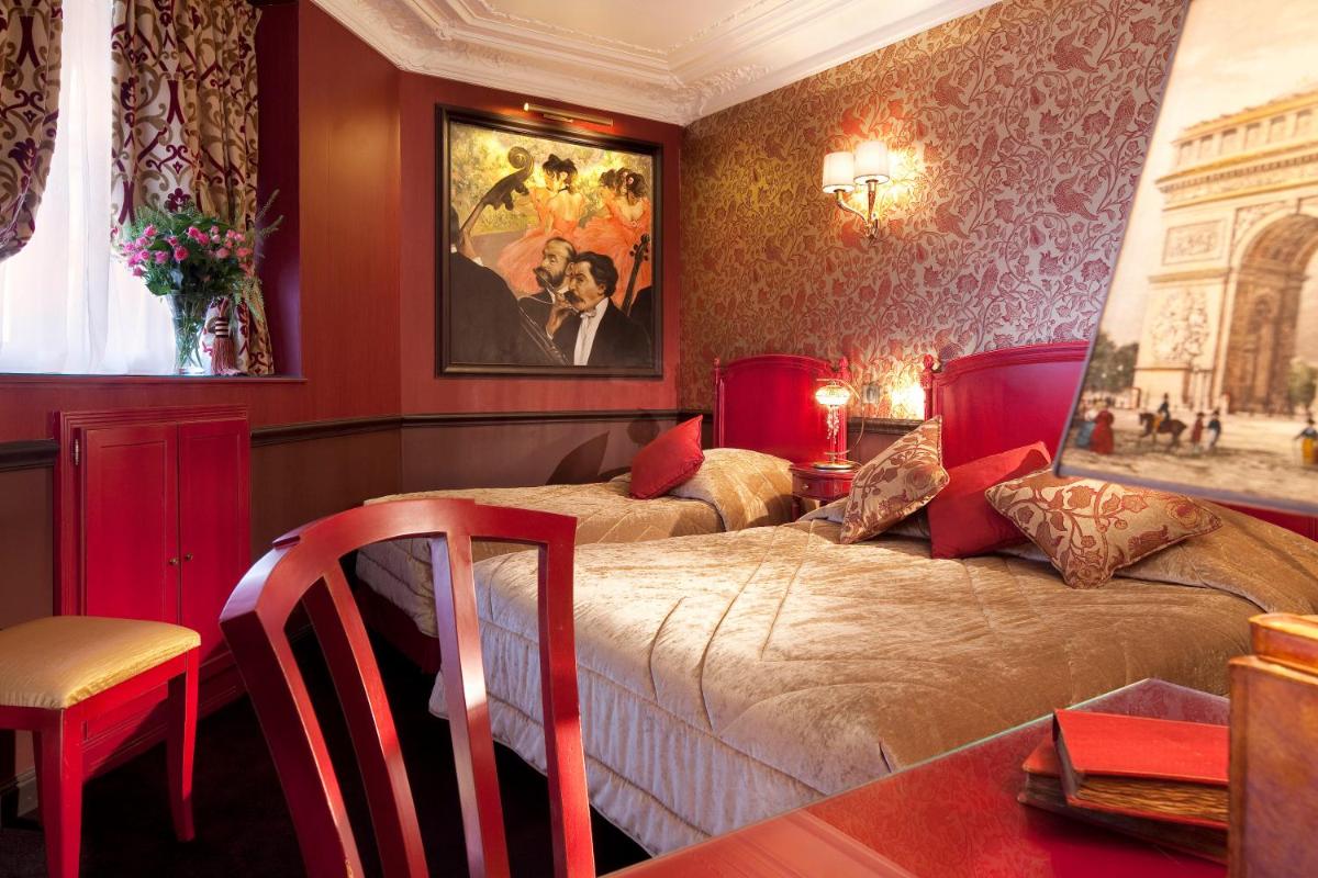 Un ou plusieurs lits dans un hébergement de l'établissement Hotel & Spa Saint-Jacques
