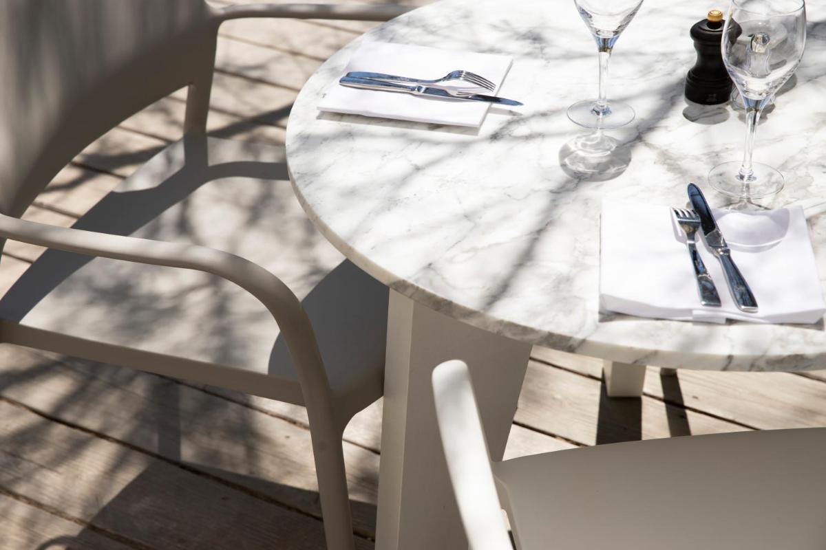 Restaurant ou autre lieu de restauration dans l'établissement Hôtel Plage Palace & Spa