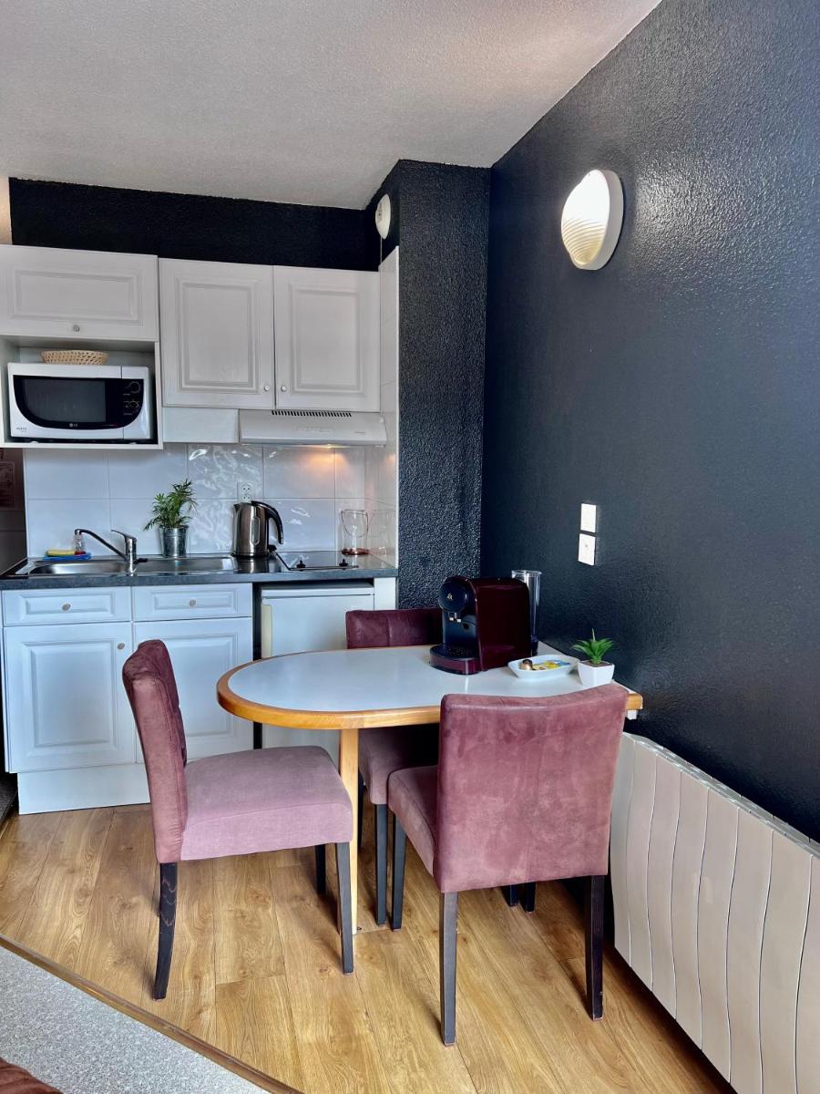 Cuisine ou kitchenette dans l'établissement Résidence Côté Chalet