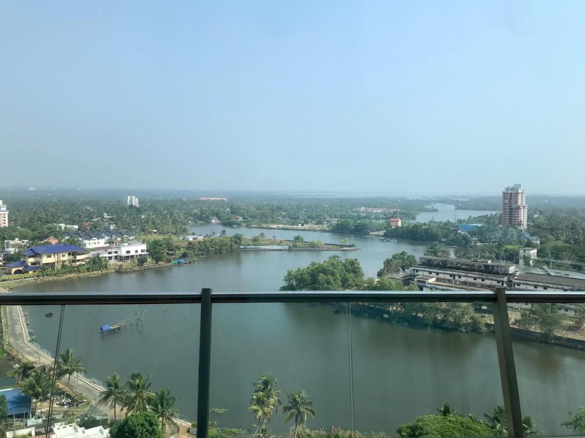 a view of a river from a building at Crowne Plaza Kochi by IHG in Cochin