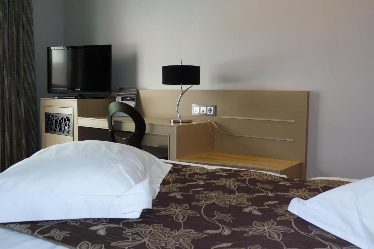 Cama o camas de una habitación en Cumbria Spa Hotel 3* Sup