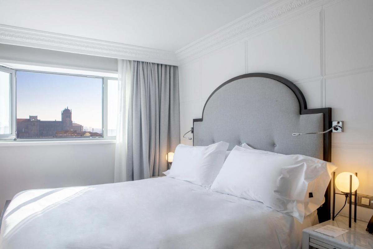 Uma cama ou camas num quarto em InterContinental Porto - Palacio das Cardosas by IHG