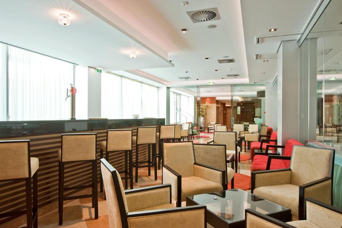 Uma área de estar em Monte Gordo Hotel Apartamentos & Spa