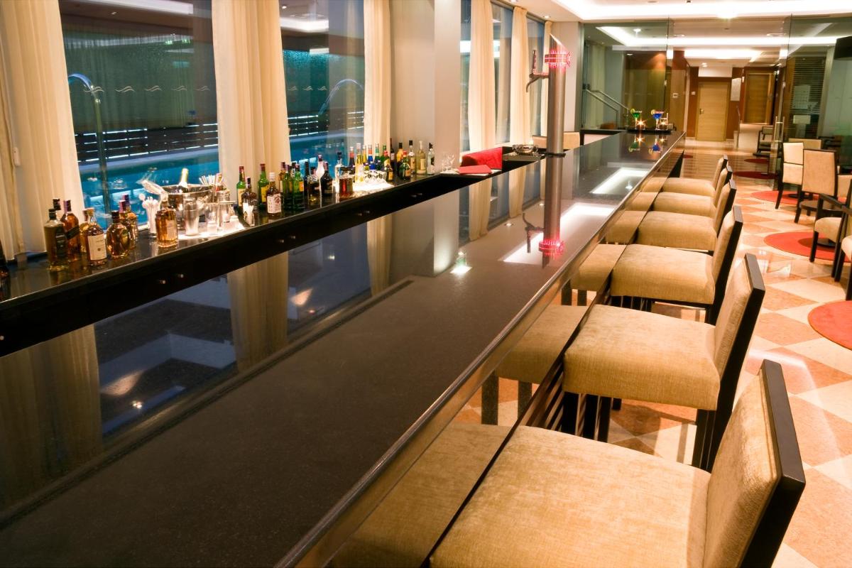 Uma área de estar em Monte Gordo Hotel Apartamentos & Spa