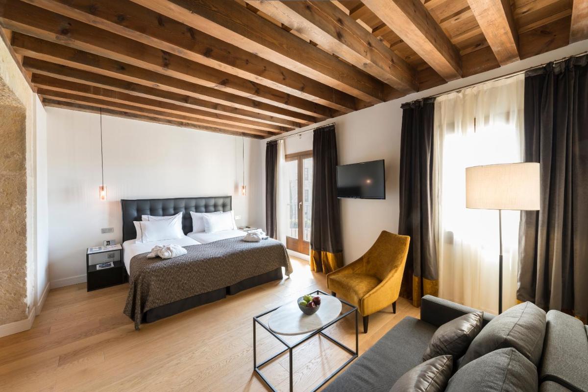 Cama o camas de una habitación en Áurea Convento Capuchinos by Eurostars Hotel Company