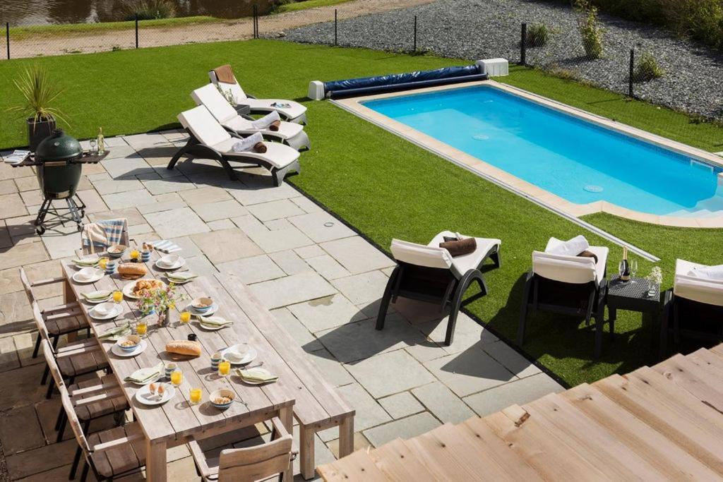 Herons House Sleeps 12, heated Pool, hot tub, sauna, games room 5 Star! - Housity