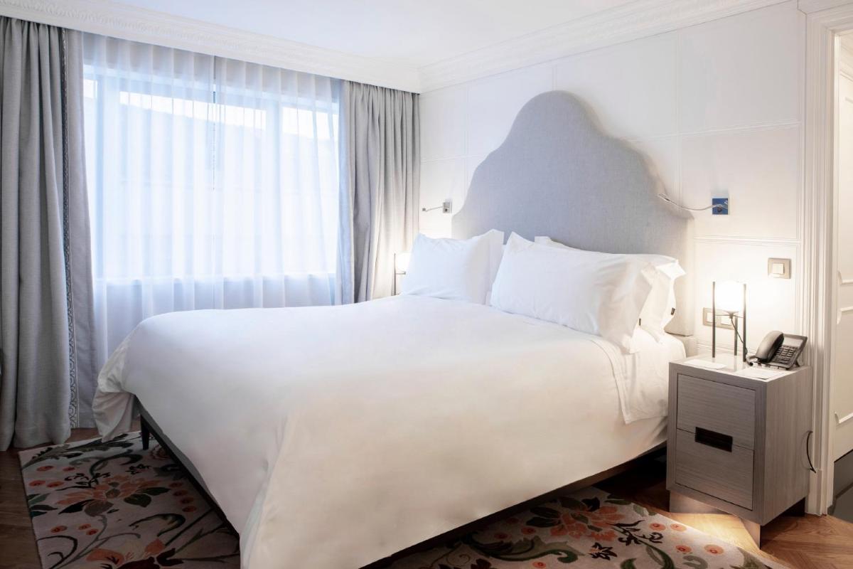 Uma cama ou camas num quarto em InterContinental Porto - Palacio das Cardosas by IHG