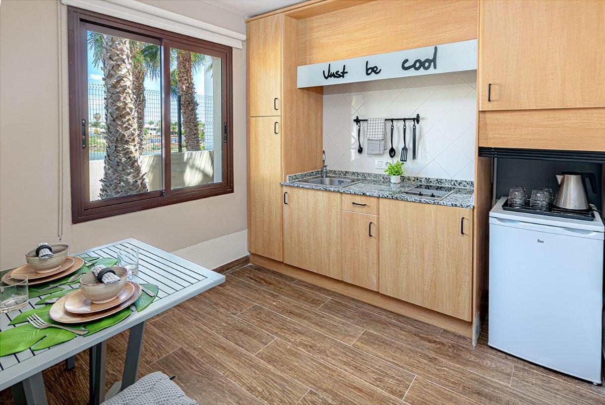 Una cocina o zona de cocina en LANZAROTE PRIME SPORTS by Vitalclass Lanzarote Resort