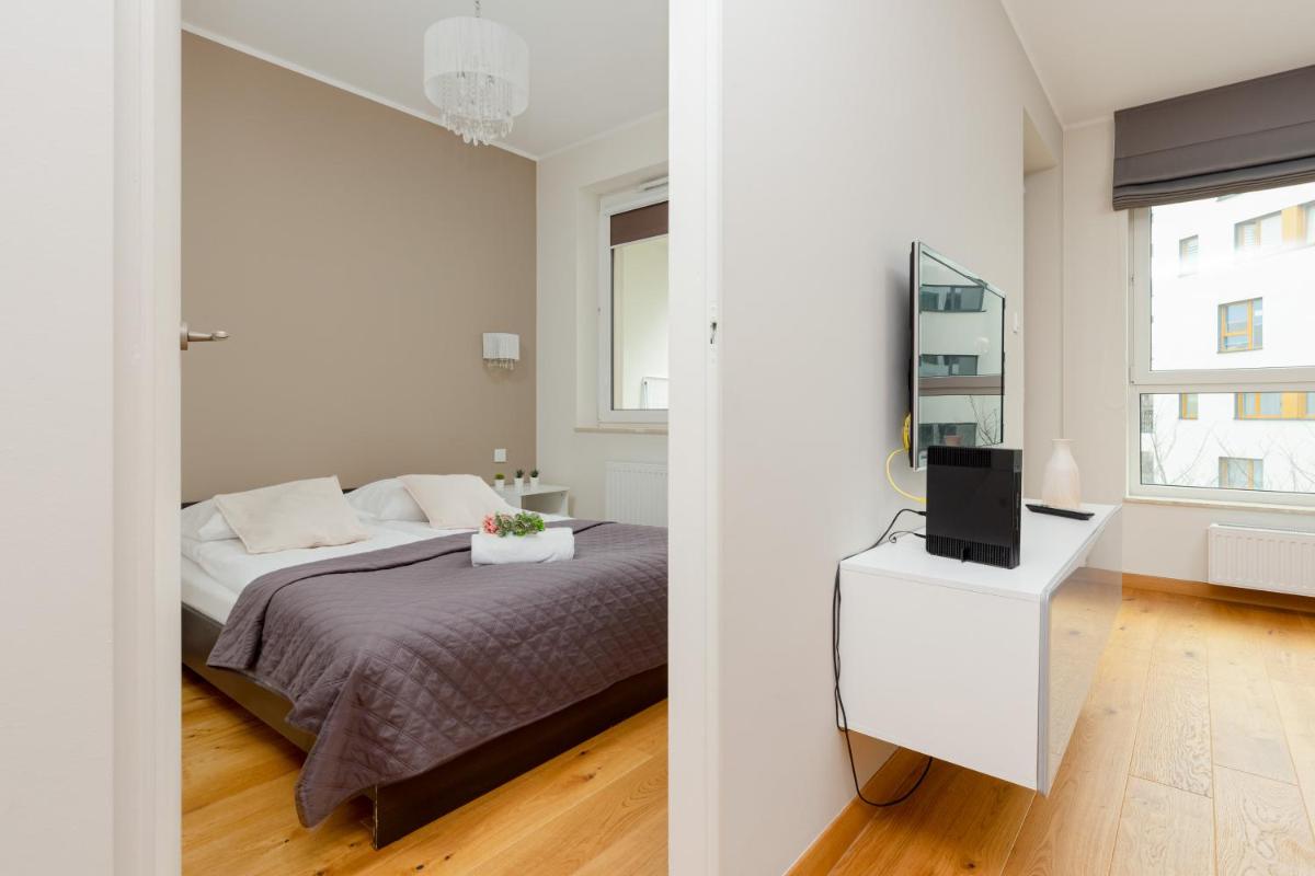 Kolorowy Gocław Apartment by Noclegi Renters - Housity