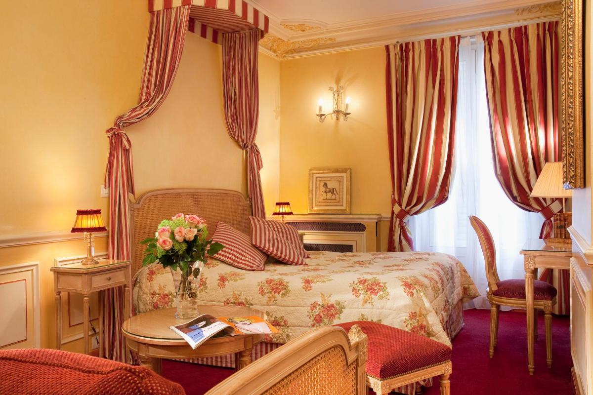 Un ou plusieurs lits dans un hébergement de l'établissement Hotel & Spa Saint-Jacques