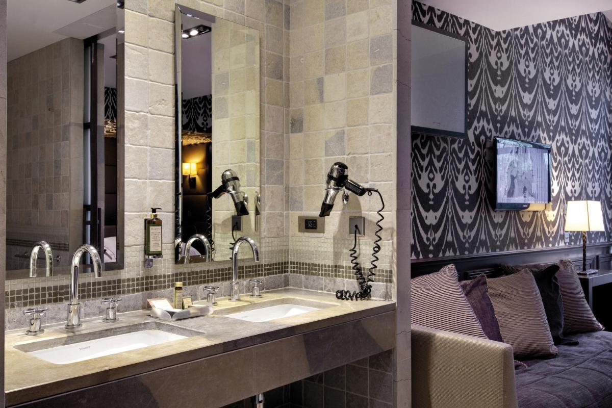 Salle de bains dans l'établissement Hôtel du Château & Spa - Teritoria