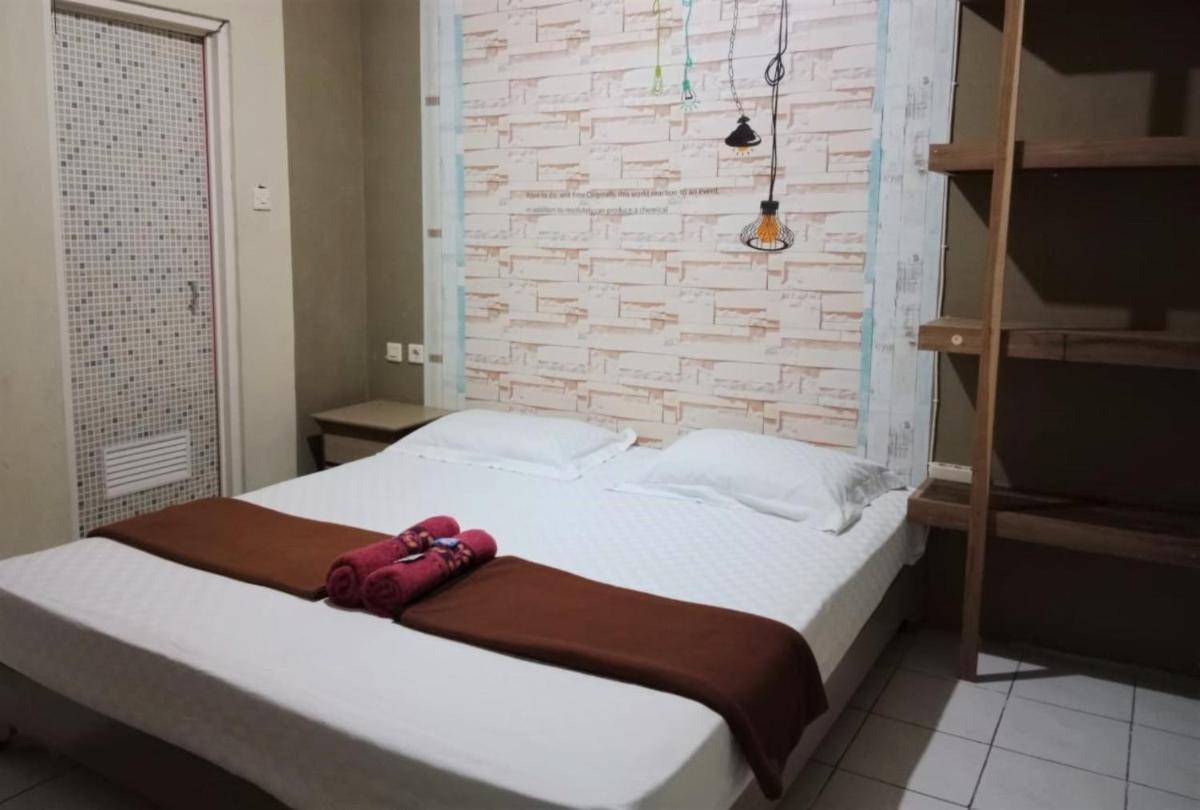 Penginapan Rudi Syariah - Housity