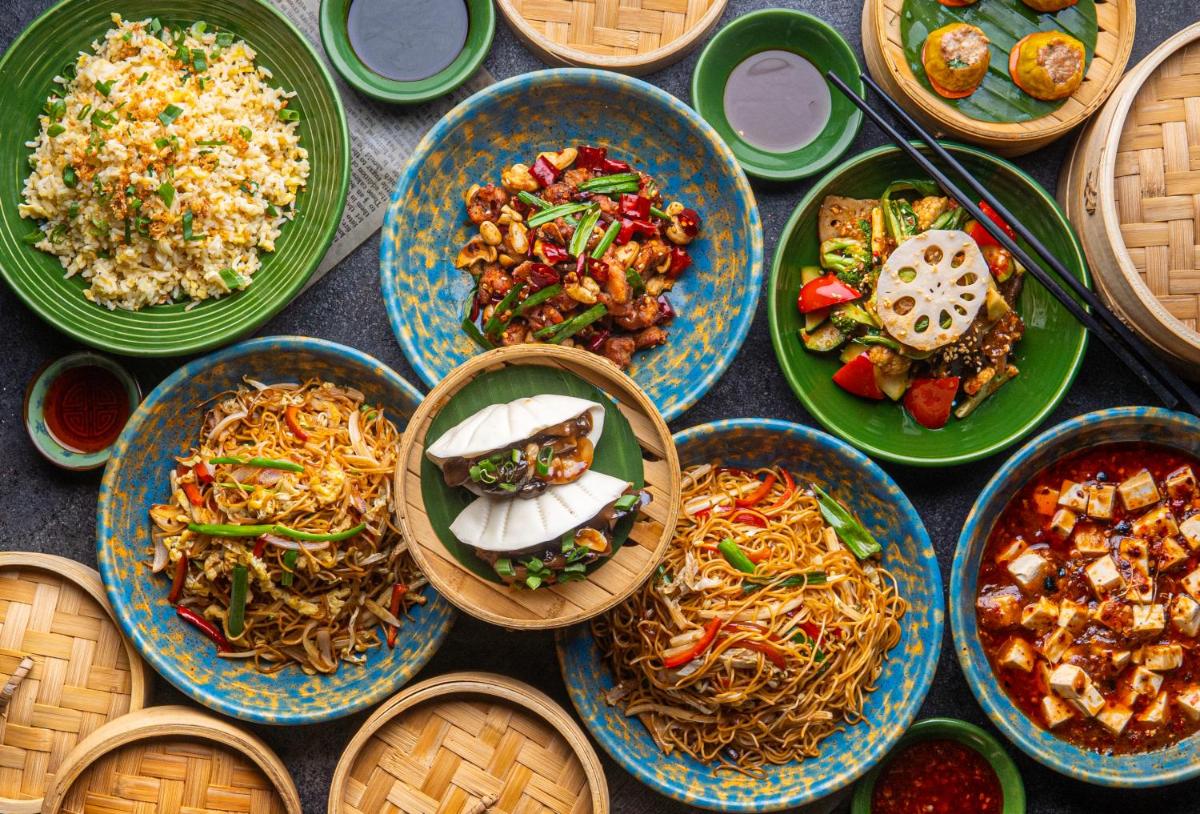a group of plates of food on a table at Hyatt Place Gurgaon Udyog Vihar in Gurgaon