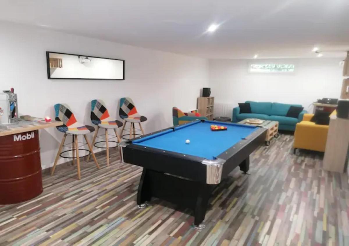 Sous-sol aménagé d'une maison - Housity