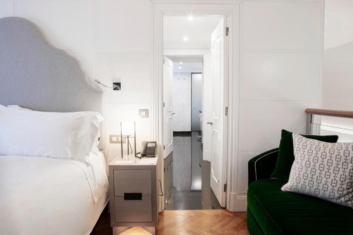 Uma cama ou camas num quarto em InterContinental Porto - Palacio das Cardosas by IHG
