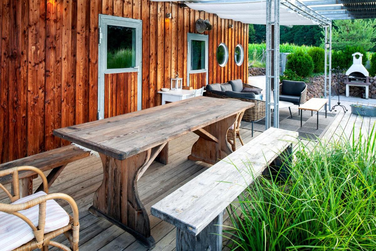 Ferienhaus mit privaten Schwimmteich und Sauna - Housity