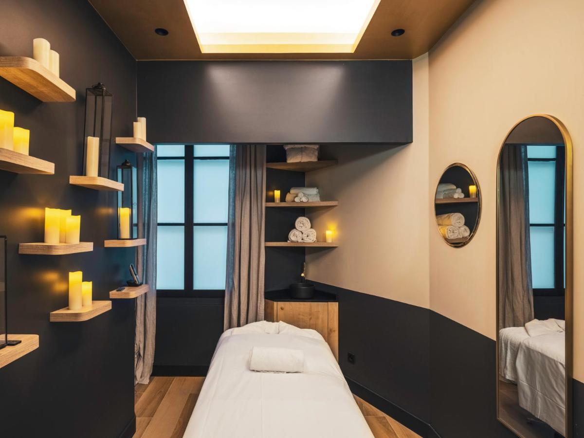 Un ou plusieurs lits dans un hébergement de l'établissement Dandy Hotel