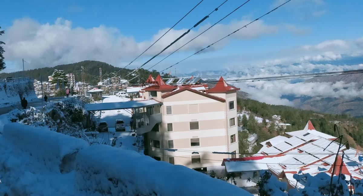 a view from a ski lift in the snow at Radisson Kufri in Shimla
