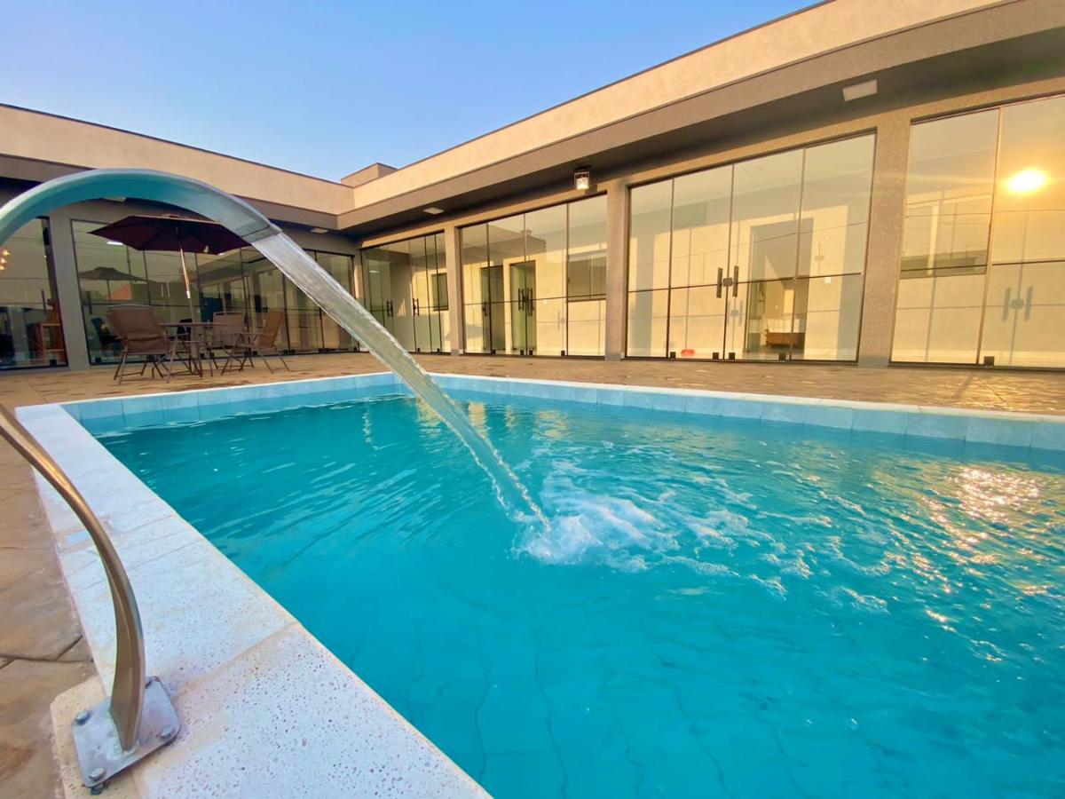 Casa Temporada Paris Thermas dos Laranjais3-Suites - Housity