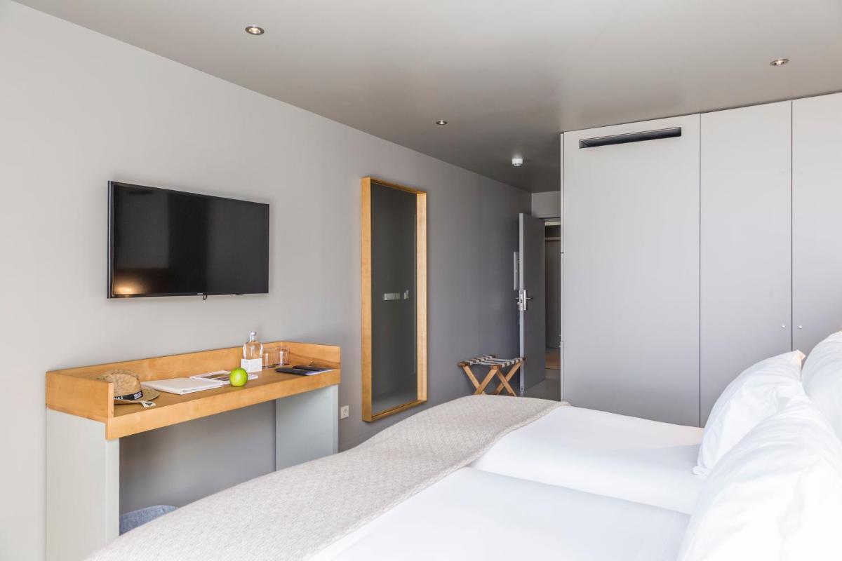 Uma cama ou camas num quarto em Villa C Boutique Hotel